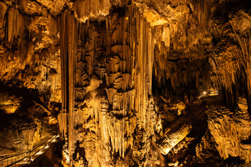 Mighty stalactites and stalagmite form the impressive scenery of the “Cueva de Nerja” dripstone...