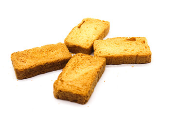 Crispy rusk on white background with selective focus