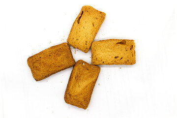 Crispy rusk on white background with selective focus
