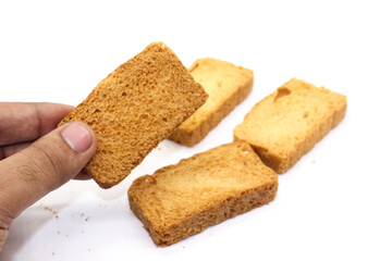 Crispy rusk on white background with selective focus