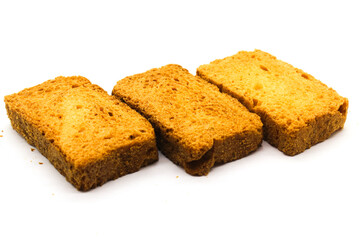 Crispy rusk on white background with selective focus