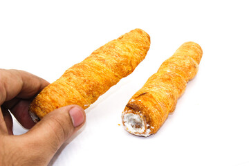 Puff cream Rolls on white background with selective focus