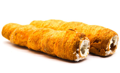 Puff cream Rolls on white background with selective focus