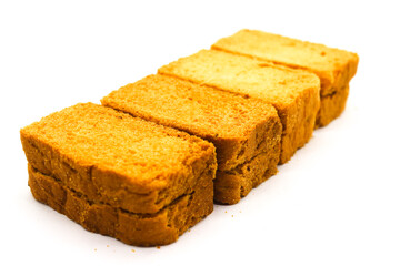 Crispy rusk on white background with selective focus
