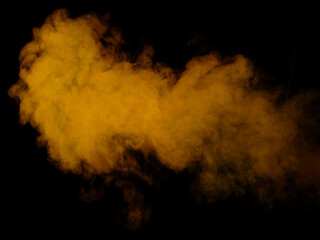 Yellow smoke texture on black background