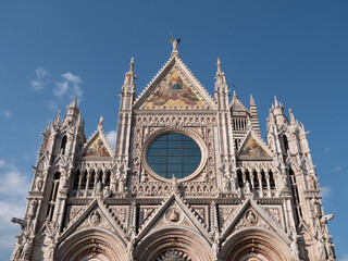 Fototapeta na wymiar Duomo di Siena Cathedral West Facade in Tuscany, Italy also called Cattedrale Metropolitana di Santa Maria Assunta