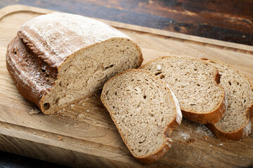 Sliced bread on a cutting board.