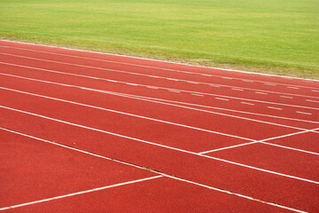 Athlsport,competition,athlete,stadium,sprint,red,running track,polyurethane,close-up,sports...