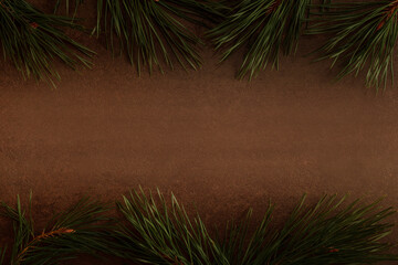 New year Christmas background with natural Christmas tree pine branches. Place to write in the middle