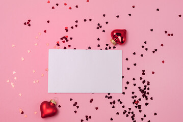 Mock up Valentines day concept Two Red Deciration in shape of hearts and White Blanck on a pink background Minimal Horizontal