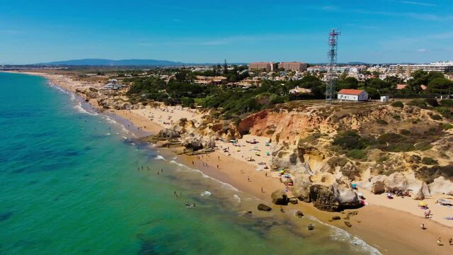 Aerials of Praia Da Gale beach, Albufeira and Armacao De Pera, Algarve, Portugal