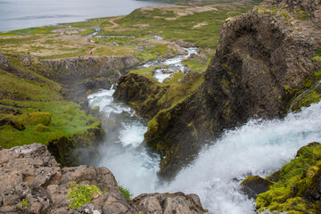 Naklejka na ściany i meble View over the waterfalls of river Dynjandi in arnarfjordur in the westfjords in Iceland