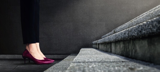 Start Concept. Woman Power. Low Section of Business Female Standing on First Step Staircase. Get Ready for Moving Forward to New Challenge. Cropped Image. Side View