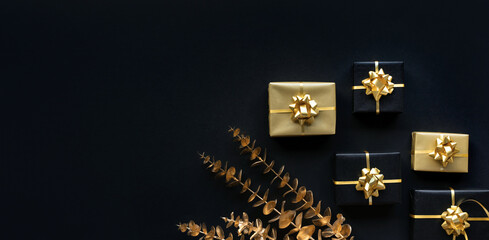 Celebration concepts with gold gift box decoration with mock up on dark background