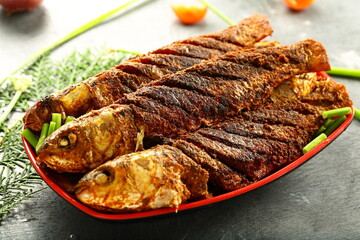 Kerala fish fry, cooked with traditional recipes.