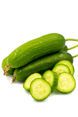 Ripe cucumbers on a white background. Close-up sliced cucumber. Story format