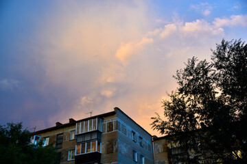 Evening beautiful stormy sky in an industrial city