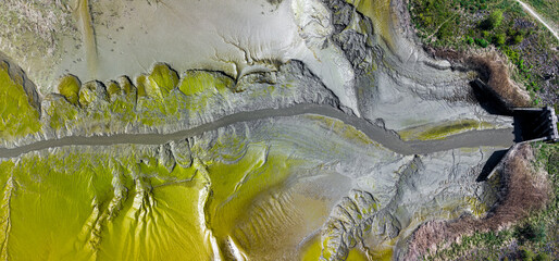 River structure into river Scheldt seen from above. Drone aerial top down photo