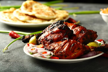 Traditional recipes- Indian tandoori chicken, marinated with spices and herbs.