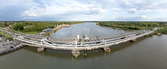 Aerial panorama shot of Temse bridge over the river Scheldt in Antwerp. Drone aerial view from above