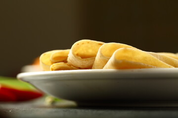 Homemade delicious chapatiis served with spicy grilled chicken. 