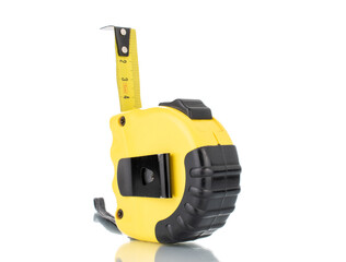 One tape measure for construction work, close-up, isolated on white.