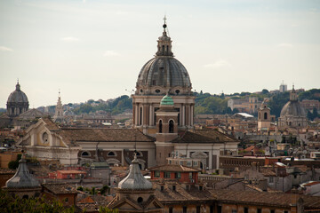 Fototapeta na wymiar Dome of st peter's cathedral. Panoramic view from above on Rome and Vatican