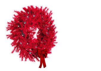 christmas wreath with a bow on white background