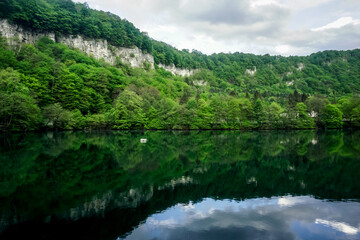 Fototapeta premium Mountain lake with reflection in the Caucasus