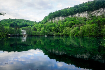 Fototapeta na wymiar Mountain lake with reflection in the Caucasus