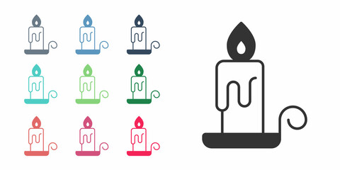 Black Burning candle in candlestick icon isolated on white background. Cylindrical candle stick with burning flame. Set icons colorful. Vector
