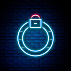 Glowing neon line Fantasy magic stone ring with gem icon isolated on brick wall background. Colorful outline concept. Vector