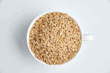 oat grains on a white background