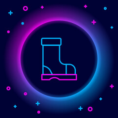 Glowing neon line Waterproof rubber boot icon isolated on black background. Gumboots for rainy weather, fishing, gardening. Colorful outline concept. Vector