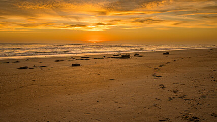 Fototapeta na wymiar Golden Sunrise on the Horizon of a Florida Barrier Island