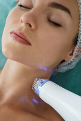 Woman during radiofrequency lifting treatment in a medical aesthetic clinic