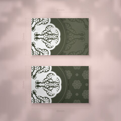 Business card in dark green color with abstract white pattern for your personality.