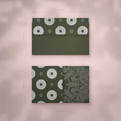 Business card in dark green color with luxurious white pattern for your brand.