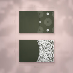 Business card template dark green with mandala white pattern for your brand.