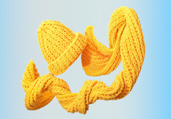 flying levitating scarf and hat. knitted winter woman yellow accessories. creative shot of warm...