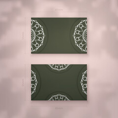 Business card template in dark green color with abstract white pattern for your business.