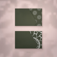 Business card template in dark green color with abstract white pattern for your personality.