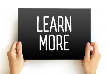 LEARN MORE text on card, concept background