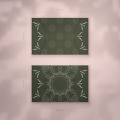 Business card template in dark green color with Indian white pattern for your contacts.