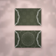 Business card template in dark green color with mandala white ornament for your contacts.
