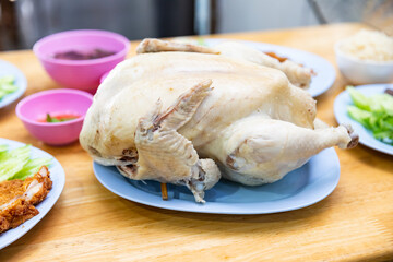 Whole boiled chicken prepared, Steam Chicken (Hainan Chicken)