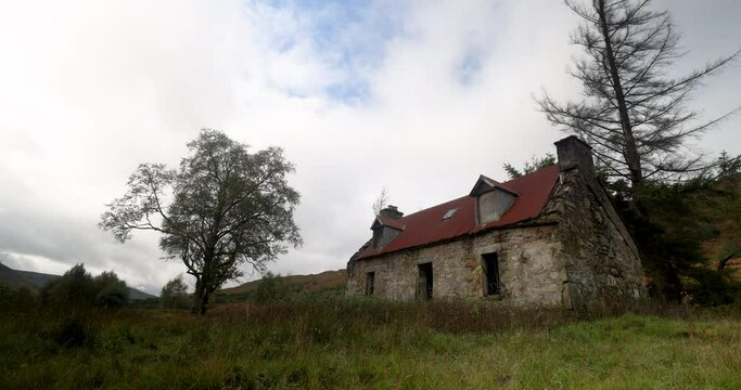 time lapse footage of clouds rolling over an ancient ruin located in a remote location near kinlochewe in the torridon region of the highlands of scotland in autumn