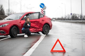 driver is standing near his car. concept of accident on the road