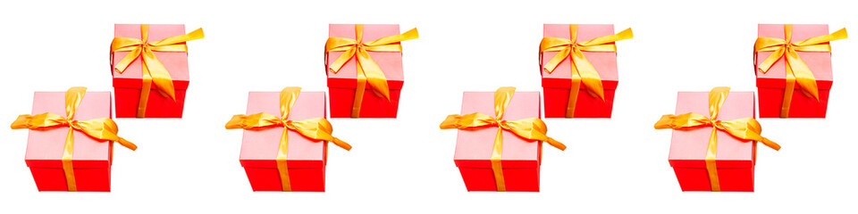 Seamless banner . Gift boxes of red color with a yellow bow. Isolated white background. Day of sales.