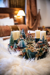 Christmas table composition. Beautiful decoration. Christmas trees, candles, stars, lights and elegant accessories. Merry Christmas and Happy Holidays, Template.